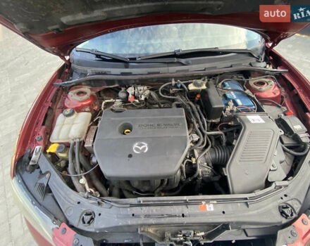 Красный Мазда 3, объемом двигателя 2 л и пробегом 244 тыс. км за 6800 $, фото 12 на Automoto.ua