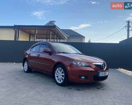 Красный Мазда 3, объемом двигателя 2 л и пробегом 244 тыс. км за 6800 $, фото 1 на Automoto.ua