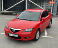 Красный Мазда 3, объемом двигателя 2 л и пробегом 205 тыс. км за 5400 $, фото 1 на Automoto.ua