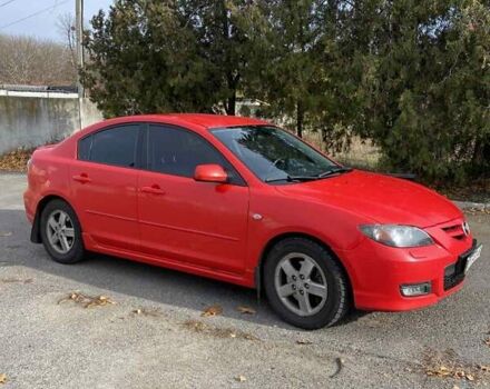 Красный Мазда 3, объемом двигателя 2 л и пробегом 160 тыс. км за 5300 $, фото 2 на Automoto.ua