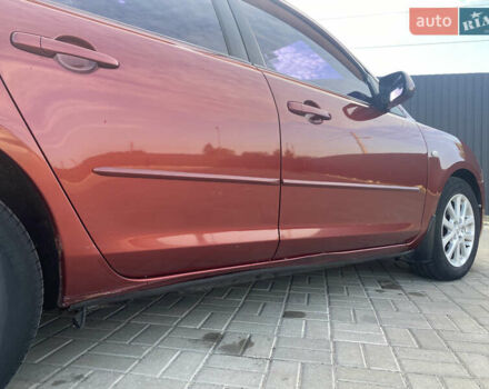 Красный Мазда 3, объемом двигателя 2 л и пробегом 244 тыс. км за 6800 $, фото 5 на Automoto.ua