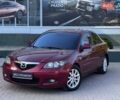 Красный Мазда 3, объемом двигателя 1.6 л и пробегом 199 тыс. км за 5871 $, фото 1 на Automoto.ua