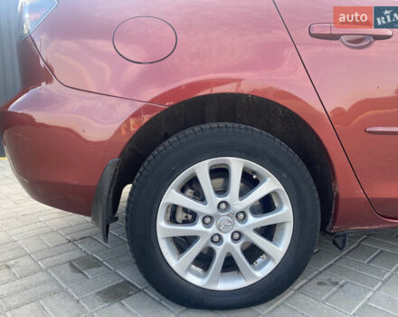 Красный Мазда 3, объемом двигателя 2 л и пробегом 244 тыс. км за 6800 $, фото 6 на Automoto.ua