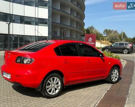 Красный Мазда 3, объемом двигателя 2 л и пробегом 240 тыс. км за 4700 $, фото 1 на Automoto.ua