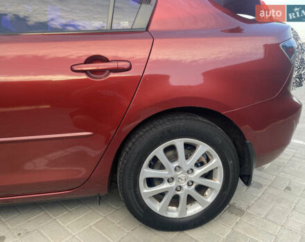 Красный Мазда 3, объемом двигателя 2 л и пробегом 244 тыс. км за 6800 $, фото 9 на Automoto.ua