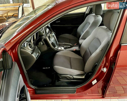 Красный Мазда 3, объемом двигателя 1.6 л и пробегом 165 тыс. км за 7600 $, фото 18 на Automoto.ua
