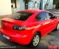 Красный Мазда 3, объемом двигателя 2 л и пробегом 200 тыс. км за 5400 $, фото 1 на Automoto.ua