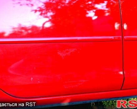 Красный Мазда 3, объемом двигателя 2 л и пробегом 203 тыс. км за 5600 $, фото 3 на Automoto.ua