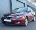 Красный Мазда 3, объемом двигателя 2 л и пробегом 247 тыс. км за 4500 $, фото 1 на Automoto.ua