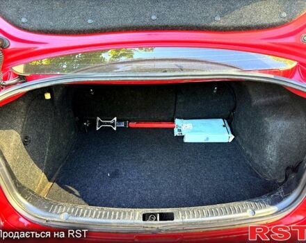 Красный Мазда 3, объемом двигателя 2 л и пробегом 200 тыс. км за 5400 $, фото 7 на Automoto.ua