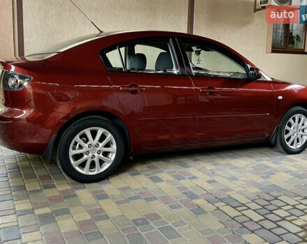 Красный Мазда 3, объемом двигателя 1.6 л и пробегом 165 тыс. км за 7600 $, фото 11 на Automoto.ua