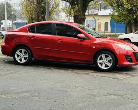 Красный Мазда 3, объемом двигателя 2 л и пробегом 199 тыс. км за 6800 $, фото 2 на Automoto.ua