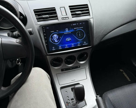 Красный Мазда 3, объемом двигателя 2 л и пробегом 217 тыс. км за 6699 $, фото 19 на Automoto.ua