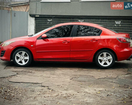 Красный Мазда 3, объемом двигателя 2 л и пробегом 199 тыс. км за 6800 $, фото 5 на Automoto.ua