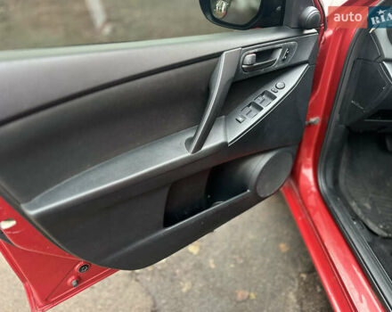 Красный Мазда 3, объемом двигателя 2 л и пробегом 199 тыс. км за 6800 $, фото 9 на Automoto.ua