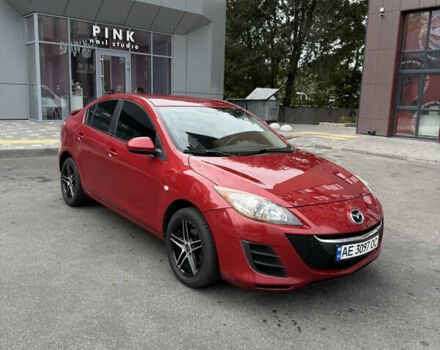 Красный Мазда 3, объемом двигателя 2 л и пробегом 217 тыс. км за 6699 $, фото 2 на Automoto.ua