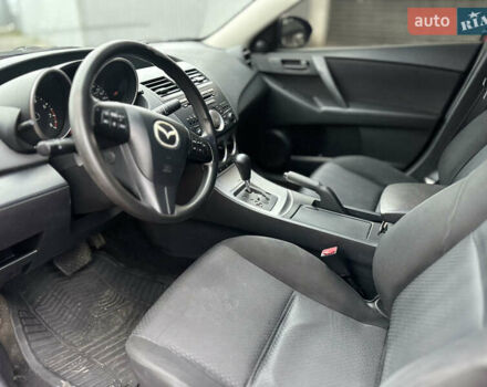 Красный Мазда 3, объемом двигателя 2 л и пробегом 199 тыс. км за 6800 $, фото 10 на Automoto.ua