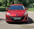 Красный Мазда 3, объемом двигателя 2 л и пробегом 200 тыс. км за 6500 $, фото 1 на Automoto.ua