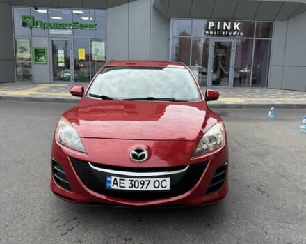 Красный Мазда 3, объемом двигателя 2 л и пробегом 217 тыс. км за 6699 $, фото 1 на Automoto.ua