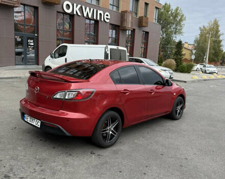 Красный Мазда 3, объемом двигателя 2 л и пробегом 217 тыс. км за 6699 $, фото 4 на Automoto.ua