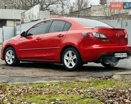 Красный Мазда 3, объемом двигателя 2 л и пробегом 199 тыс. км за 6800 $, фото 6 на Automoto.ua
