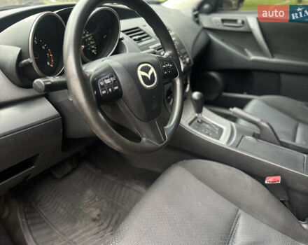 Красный Мазда 3, объемом двигателя 2 л и пробегом 199 тыс. км за 6800 $, фото 14 на Automoto.ua