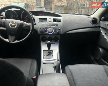 Красный Мазда 3, объемом двигателя 2 л и пробегом 199 тыс. км за 6800 $, фото 21 на Automoto.ua