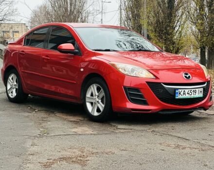 Красный Мазда 3, объемом двигателя 2 л и пробегом 199 тыс. км за 6800 $, фото 1 на Automoto.ua