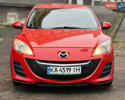 Красный Мазда 3, объемом двигателя 2 л и пробегом 199 тыс. км за 6800 $, фото 1 на Automoto.ua