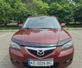 Красный Мазда 3, объемом двигателя 1.6 л и пробегом 238 тыс. км за 5200 $, фото 1 на Automoto.ua