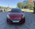 Красный Мазда 3, объемом двигателя 2 л и пробегом 225 тыс. км за 7700 $, фото 1 на Automoto.ua