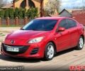 Красный Мазда 3, объемом двигателя 2 л и пробегом 202 тыс. км за 7000 $, фото 1 на Automoto.ua