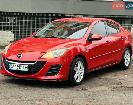 Красный Мазда 3, объемом двигателя 2 л и пробегом 199 тыс. км за 6800 $, фото 4 на Automoto.ua