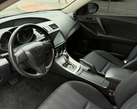 Красный Мазда 3, объемом двигателя 2 л и пробегом 217 тыс. км за 6699 $, фото 8 на Automoto.ua