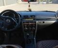Красный Мазда 3, объемом двигателя 1.6 л и пробегом 185 тыс. км за 5500 $, фото 5 на Automoto.ua