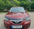 Красный Мазда 3, объемом двигателя 1.59 л и пробегом 238 тыс. км за 5200 $, фото 1 на Automoto.ua