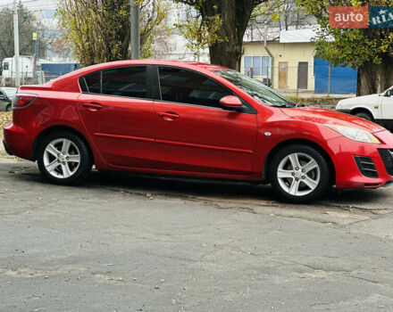 Красный Мазда 3, объемом двигателя 2 л и пробегом 199 тыс. км за 6800 $, фото 3 на Automoto.ua