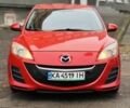 Красный Мазда 3, объемом двигателя 2 л и пробегом 199 тыс. км за 6800 $, фото 1 на Automoto.ua
