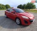 Красный Мазда 3, объемом двигателя 2 л и пробегом 161 тыс. км за 6600 $, фото 1 на Automoto.ua