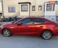 Красный Мазда 3, объемом двигателя 2 л и пробегом 89 тыс. км за 13064 $, фото 1 на Automoto.ua