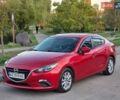 Красный Мазда 3, объемом двигателя 2 л и пробегом 144 тыс. км за 9800 $, фото 1 на Automoto.ua