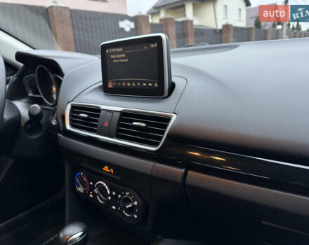 Красный Мазда 3, объемом двигателя 2 л и пробегом 117 тыс. км за 10900 $, фото 18 на Automoto.ua