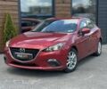 Красный Мазда 3, объемом двигателя 2 л и пробегом 128 тыс. км за 9500 $, фото 1 на Automoto.ua