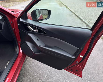 Красный Мазда 3, объемом двигателя 2 л и пробегом 117 тыс. км за 10900 $, фото 16 на Automoto.ua