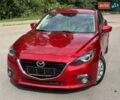 Красный Мазда 3, объемом двигателя 1.5 л и пробегом 105 тыс. км за 13700 $, фото 1 на Automoto.ua