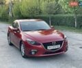 Красный Мазда 3, объемом двигателя 1.5 л и пробегом 95 тыс. км за 13300 $, фото 1 на Automoto.ua