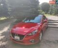 Красный Мазда 3, объемом двигателя 2 л и пробегом 152 тыс. км за 11900 $, фото 1 на Automoto.ua