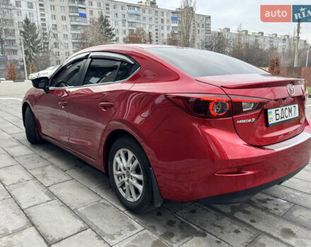 Красный Мазда 3, объемом двигателя 1.5 л и пробегом 140 тыс. км за 13950 $, фото 3 на Automoto.ua