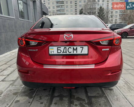 Красный Мазда 3, объемом двигателя 1.5 л и пробегом 140 тыс. км за 13950 $, фото 4 на Automoto.ua