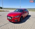 Красный Мазда 3, объемом двигателя 2 л и пробегом 125 тыс. км за 11000 $, фото 1 на Automoto.ua